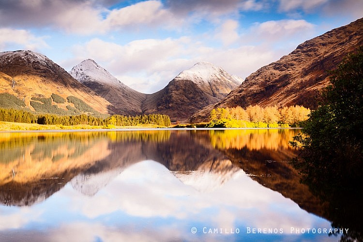 Reflection of Lairig Gartain separating the Buachaille Etive beag from the Buachaille Etive Mor in Lochan Urr, Glen Etive