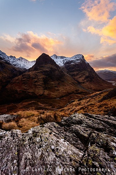 A winter sunset behind the Three Sisters, Glen Coe.