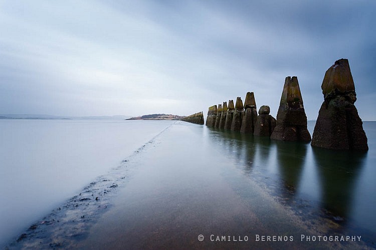 Moody long exposure of Cramond causeway starting to flood.