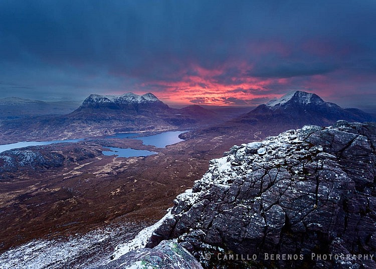 A spectacular interplay between warm and cool tones in the clouds at dawn, Stac Pollaidh.