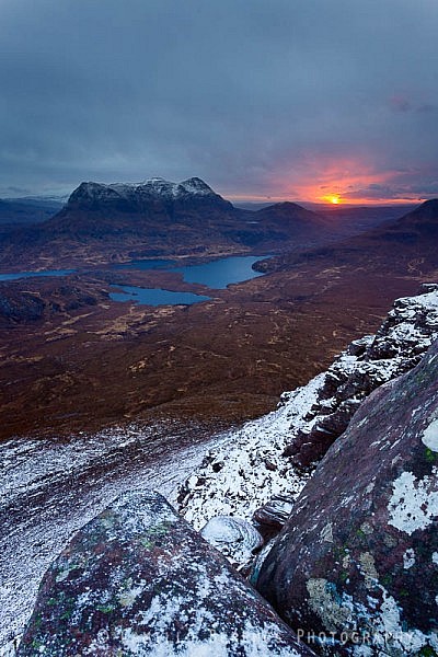 Cul Mor seen from the snow-covered slopes of Stac Pollaidh at sunrise