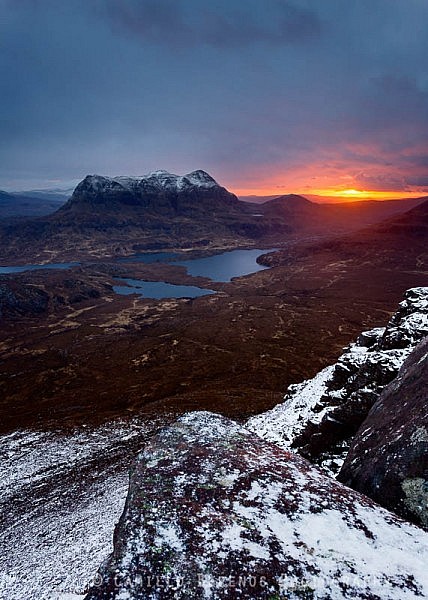 Sunrise behind Cul Mor seen from the summit of Stac Pollaidh