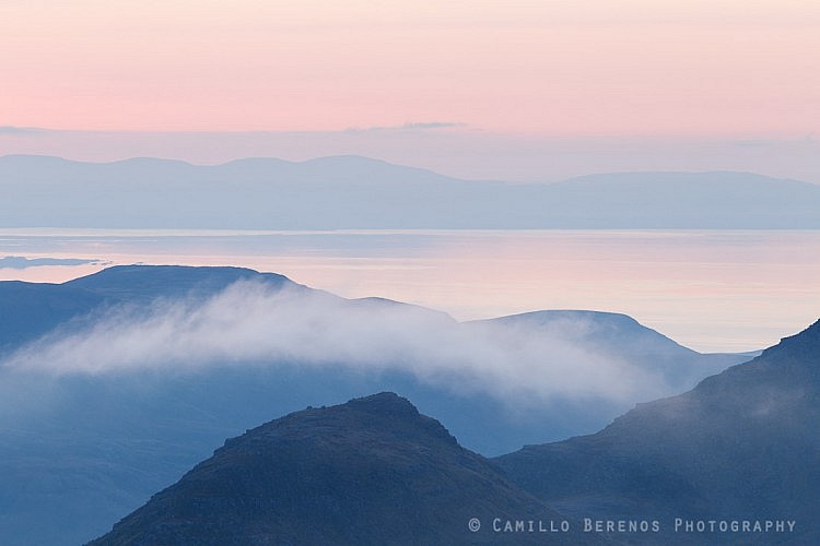 The Trotternish peninsula at dusk behind the ridges of Baosbheinn and Beinn Alligin