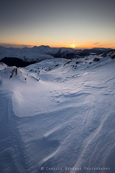 Some wonderful textures in the snowdrifts on Sgurr Mhic Bharraich with the Arnisdale hills and the Black Cuillin as backdrop