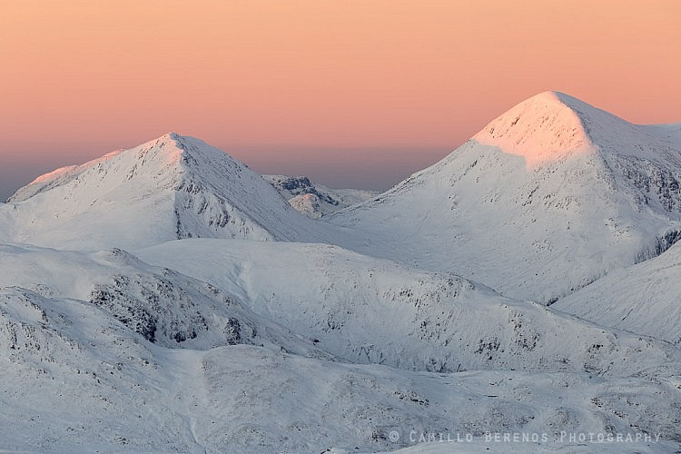 Alpenglow at sunrise on a snow-covered Beinn Sgritheall