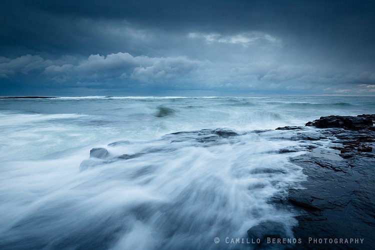 Large waves crash on the shores near Craster