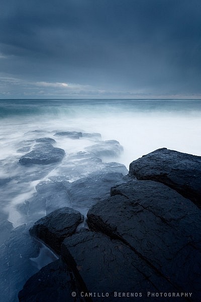 A stormy North Sea batters the rocky coast near Craster