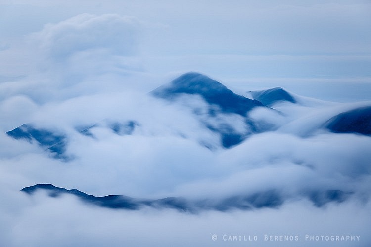 Sgurr Mor almost encapsulated by clouds and an inversion